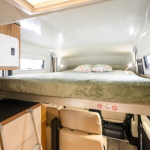 Lits escamotables dans les camping-cars : confort et espace pendant le voyage